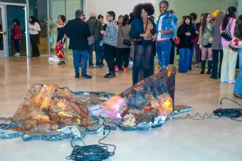people in gallery during art opening